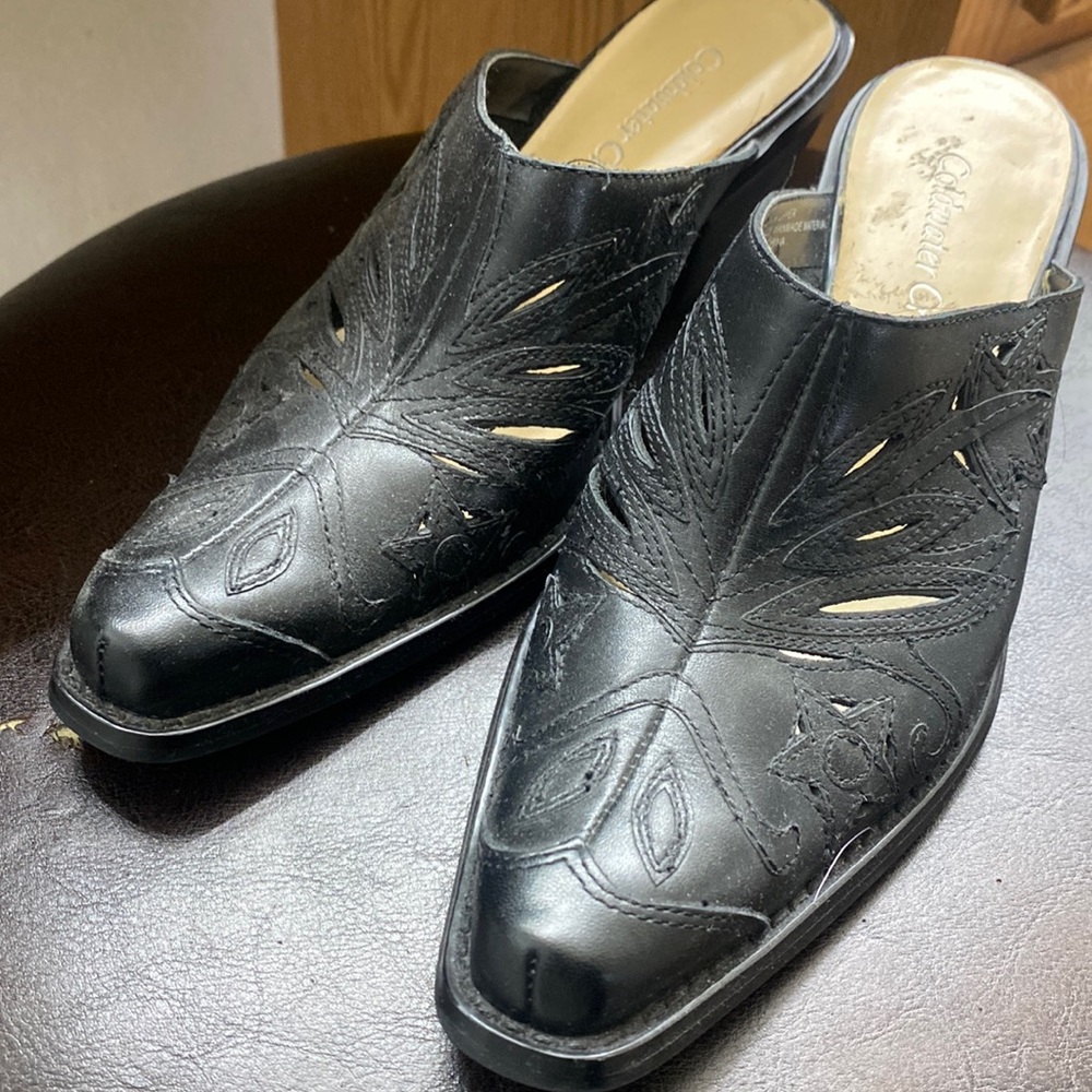 Black leather mules